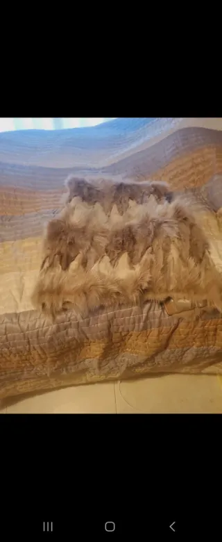 Chaleco pelo zorro...es de patas de zorro  cremall