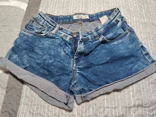 Shorts vaqueros desgastados mujer