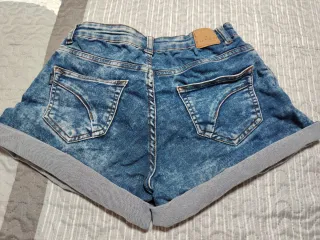 Shorts vaqueros desgastados mujer