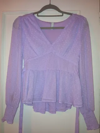 Blusa manga larga semitransparente