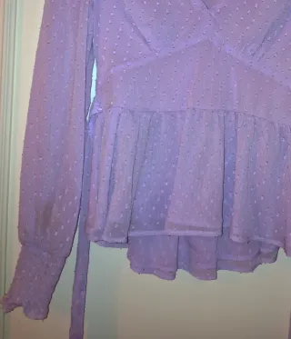 Blusa manga larga semitransparente