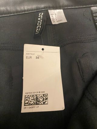 Minifalda negra efecto piel