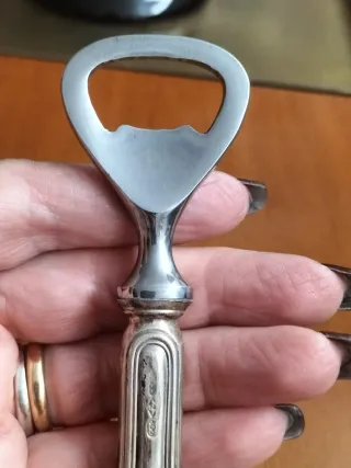 Apribottiglie vintage Argento 800 e Acciaio