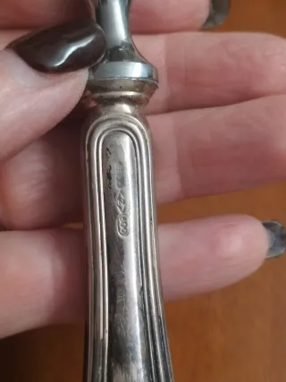 Apribottiglie vintage Argento 800 e Acciaio