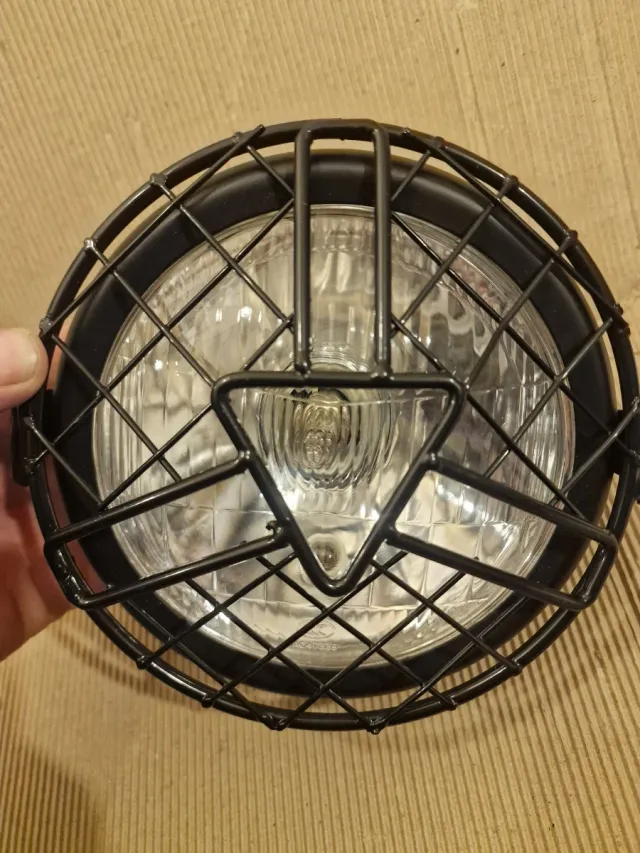 Faro moto con griglia protettiva nuovo