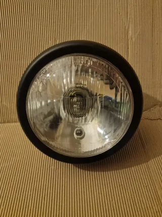 Faro moto con griglia protettiva nuovo