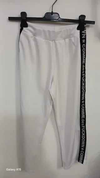 Pantaloni a gamba ampia bianchi con banda laterale