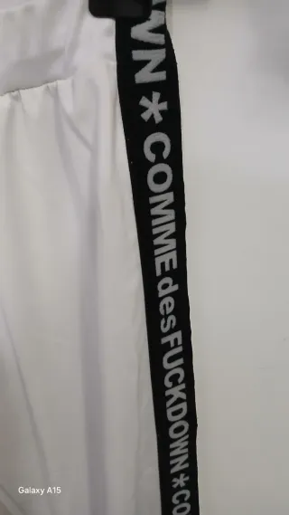 Pantaloni a gamba ampia bianchi con banda laterale