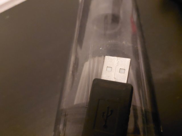 Aspirador de mano con manguera