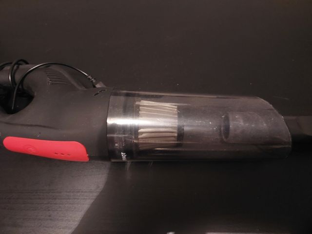 Aspirador de mano con manguera