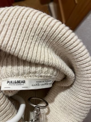 Jersey de punto beige y negro