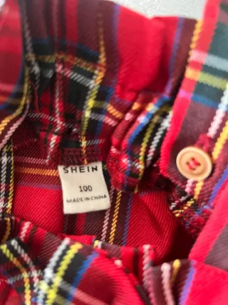 Gonna con bretelle a quadri rossa