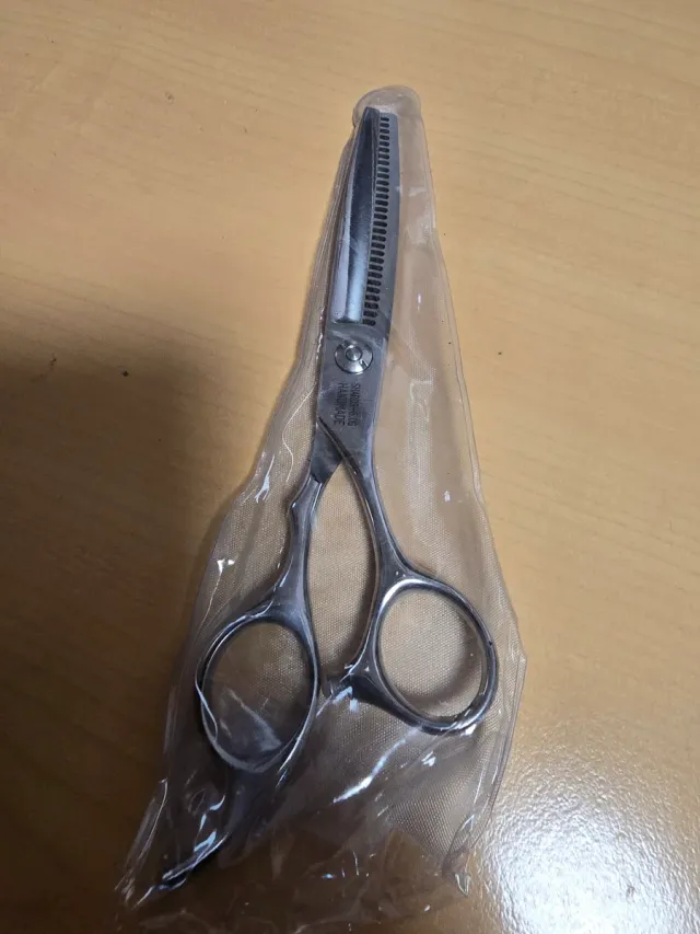 Tijeras de entresacar para peluquería