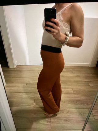 Pantaloni arancioni vita alta taglia L