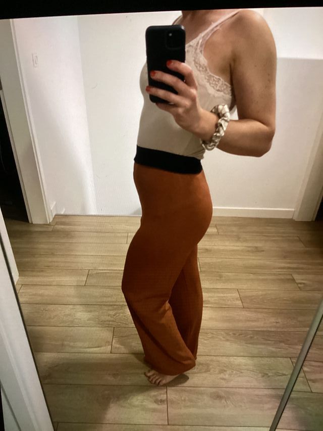 Pantaloni arancioni vita alta taglia L