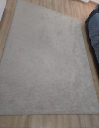 Alfombra beige de tela