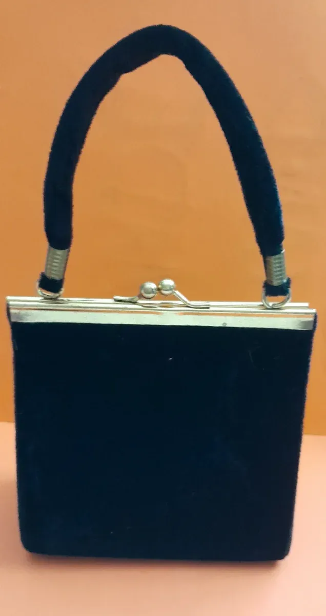 Bolso de mano de terciopelo