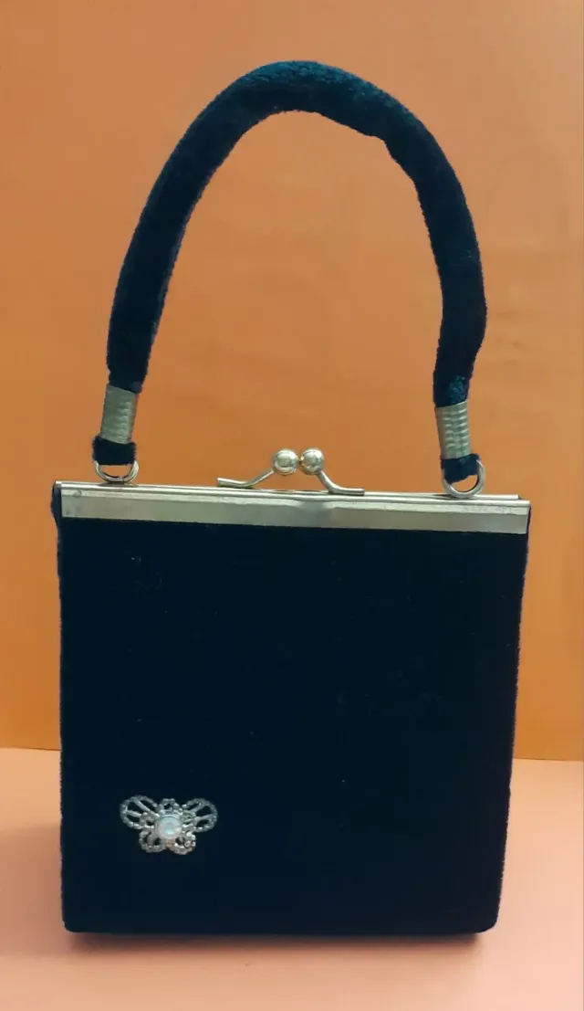 Bolso de mano de terciopelo