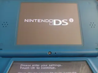 Nintendo DSi XL Azul + New Super Mario Bros.