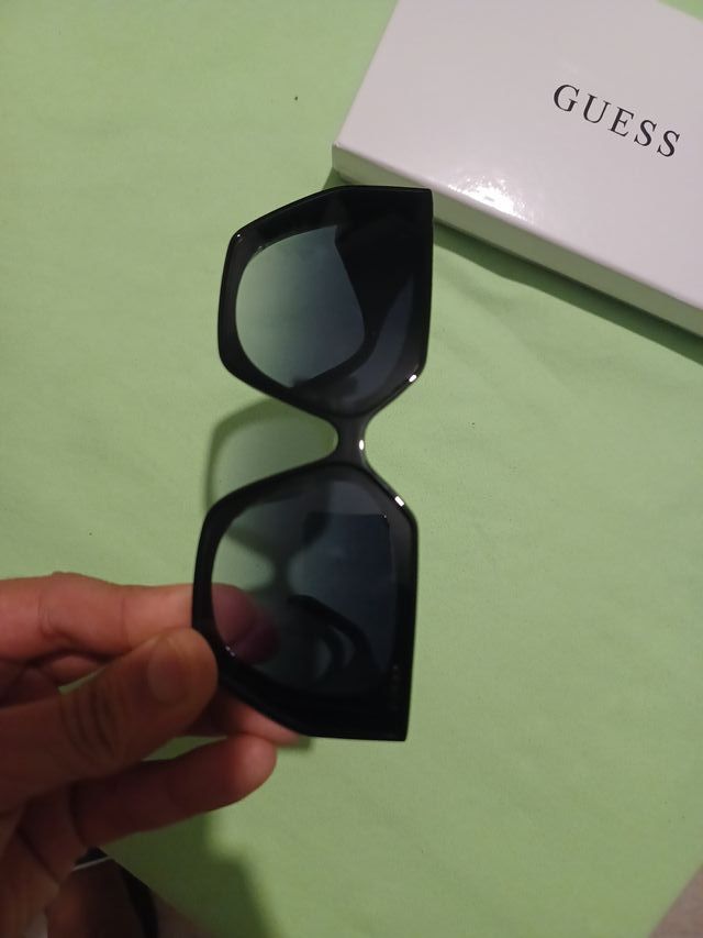 Gafas de sol Prada negras y grises