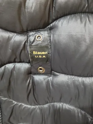 Blauer XXL, plumas.