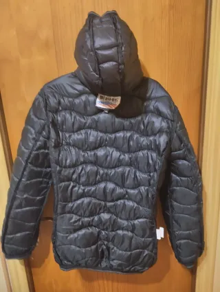 Blauer XXL, plumas.