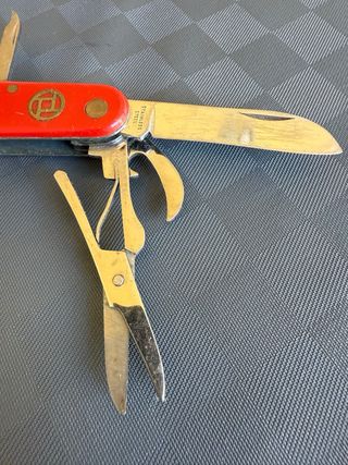 Coltellino multiuso tascabile rosso