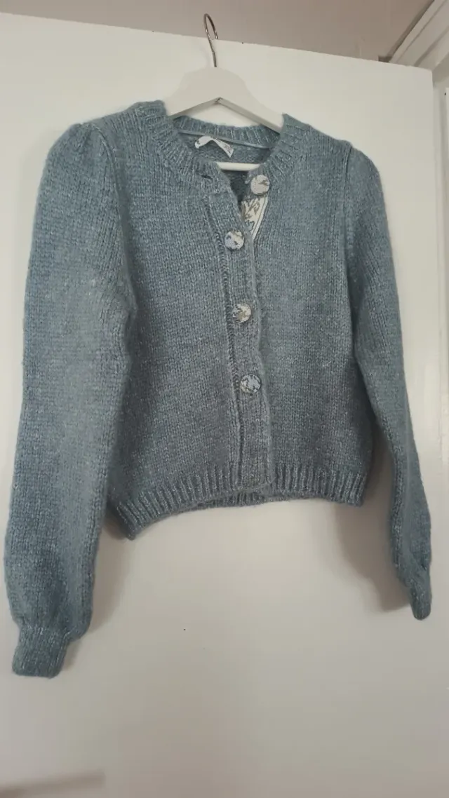 Cárdigan azul tejido, usado una vez