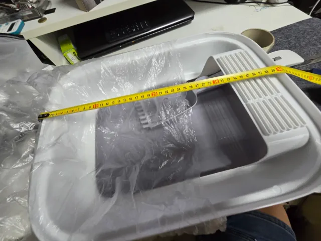 Arenero para gatos con rejilla