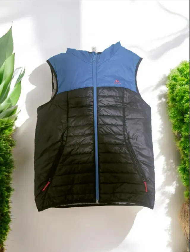 Chaqueton sin mangas Quechua acolchado azul y negr