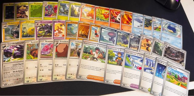 56 cartas con Carta XL Holo de Zacian EX de Paul.
