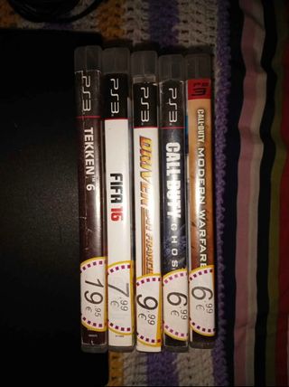Consola PS3 con 2 mandos y juegos