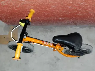 Bicicleta de equilibrio infantil naranja btwin