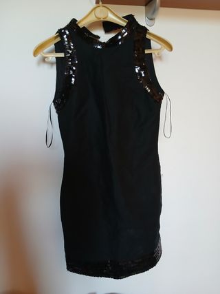 Top nero con paillettes oro