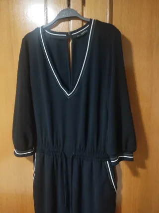 Mono negro manga larga talla S.