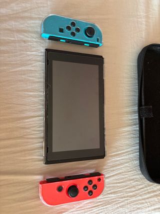 Nintendo Switch con Joy-Cons Azul y Rojo +2 juegos