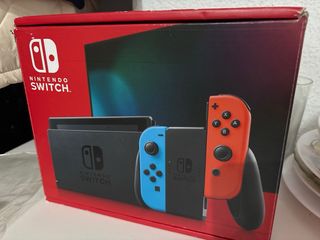 Nintendo Switch con Joy-Cons Azul y Rojo +2 juegos