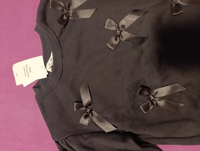 Sudadera niña negra con lazos H&m 6-8 años