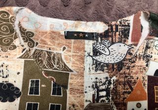 Jersey estampado casas y pájaros.