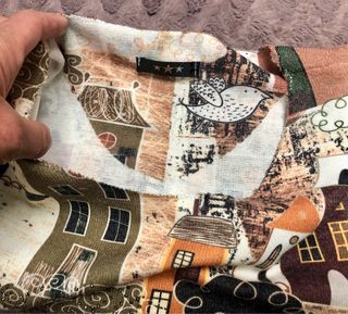 Jersey estampado casas y pájaros.