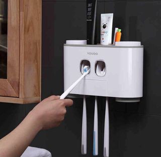 Dispensador pasta dientes automático