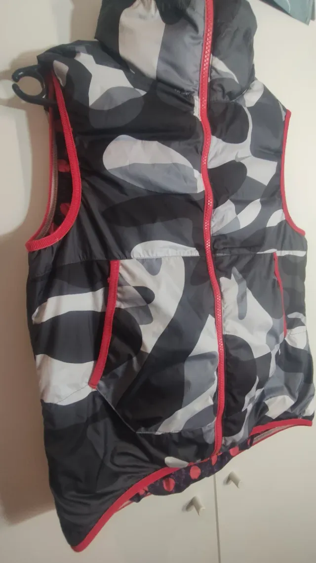 Chaleco reversible Nike niña-ño lunares