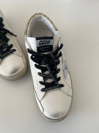 Golden Goose Zapatillas Blancas y Doradas