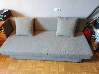 Sofá cama gris de tela