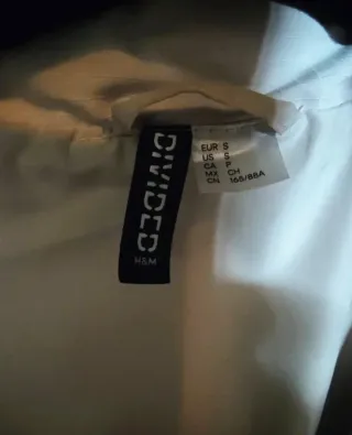 Chaleco oversize H&M beige talla única