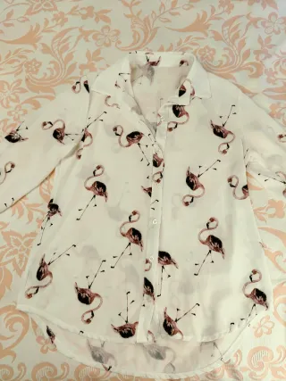 Blusa blanca con flamencos