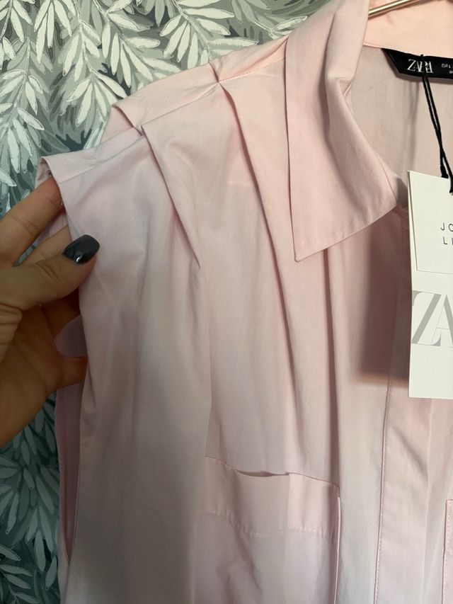 Vestido rosa sin mangas drapeado