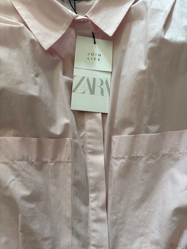 Vestido rosa sin mangas drapeado