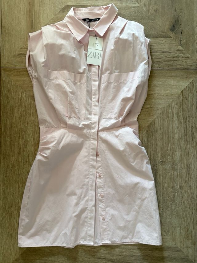 Vestido rosa sin mangas drapeado