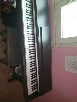 Piano Yamaha Arius